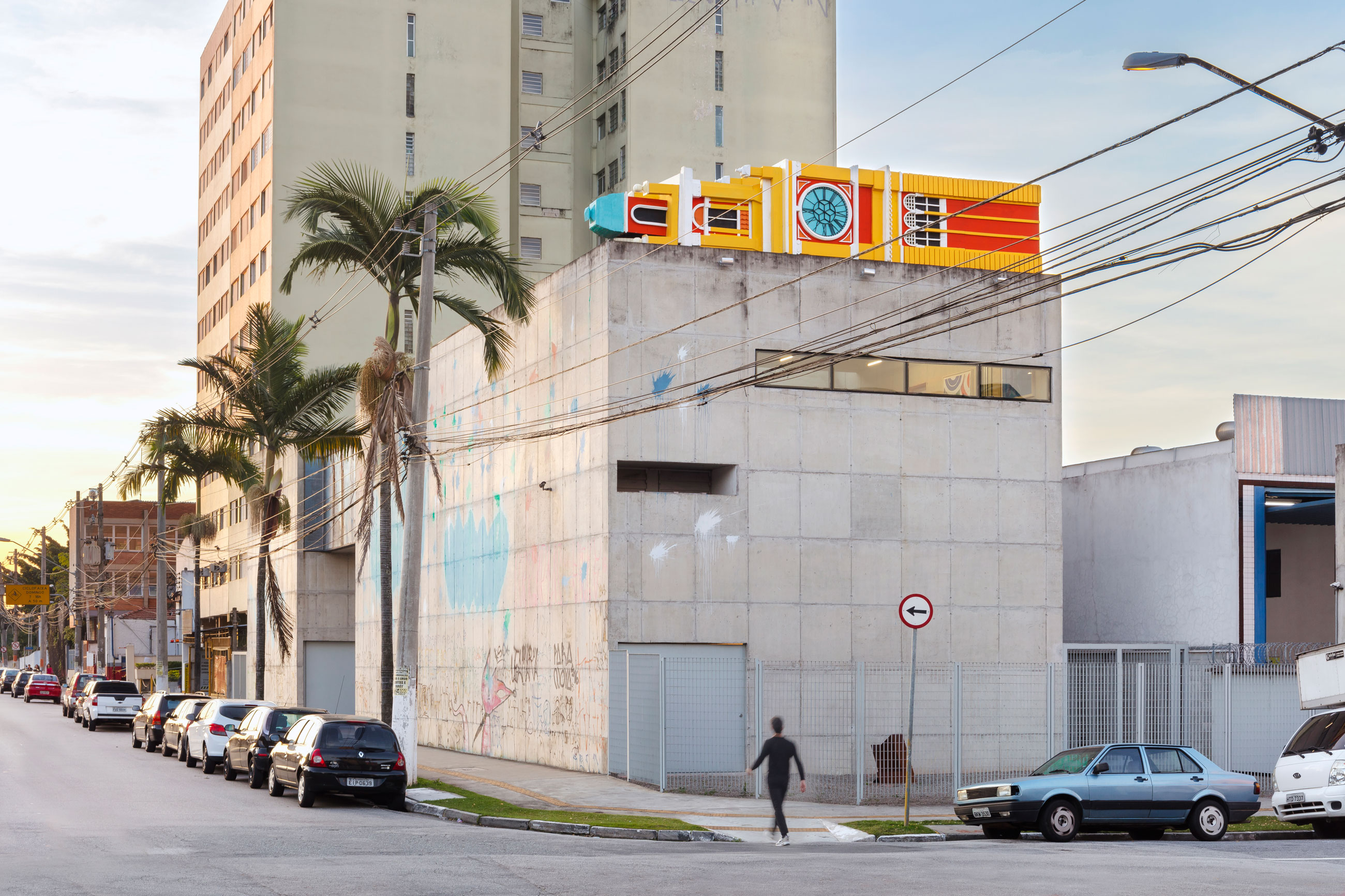 Site-specific Installation titled Friends of Perpetual Movement by artist Quinteros, consisting of a clock tower built with foam, paint, wooden structure, curated by Bruno Alves de Almeida for the project SITU at Galeria Leme, São Paulo, Brazil.