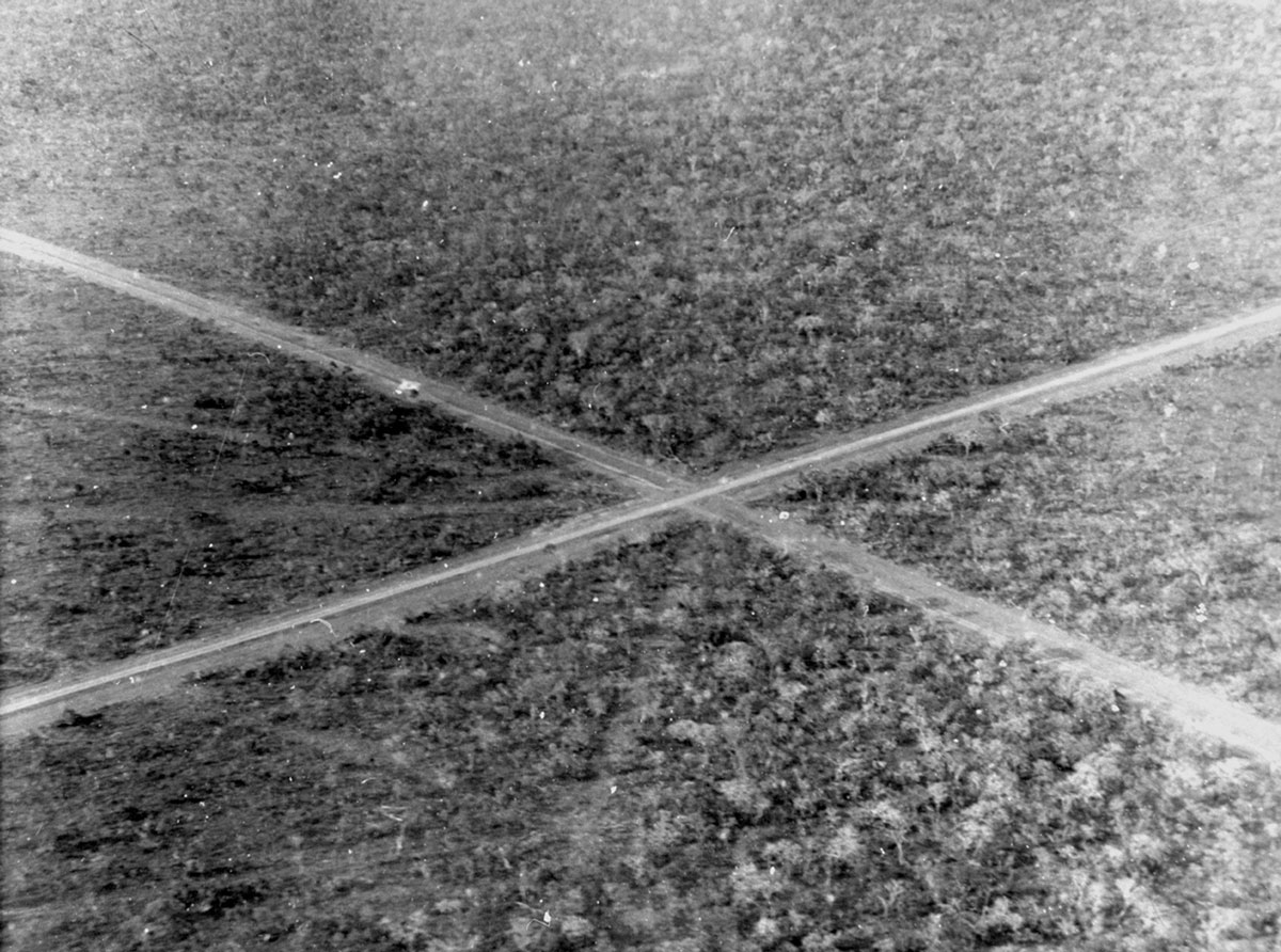 Aerial black and white photo of the Opening of the road axes that define the pilot plan for Brasilia. Ground zero of the new capital of Brazil in 1957.